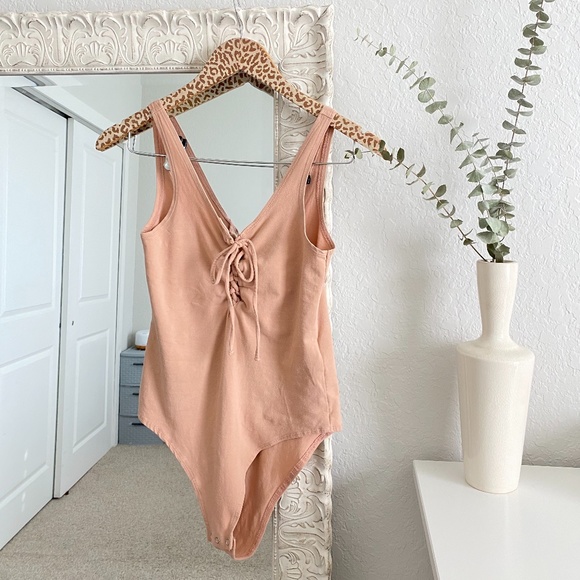 Topshop Tops - Topshop Bodysuit Blush Pink Lace Up Bodysuit US 6